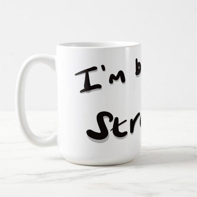 Jag breder ut en stark kaffemugg (Vänster)