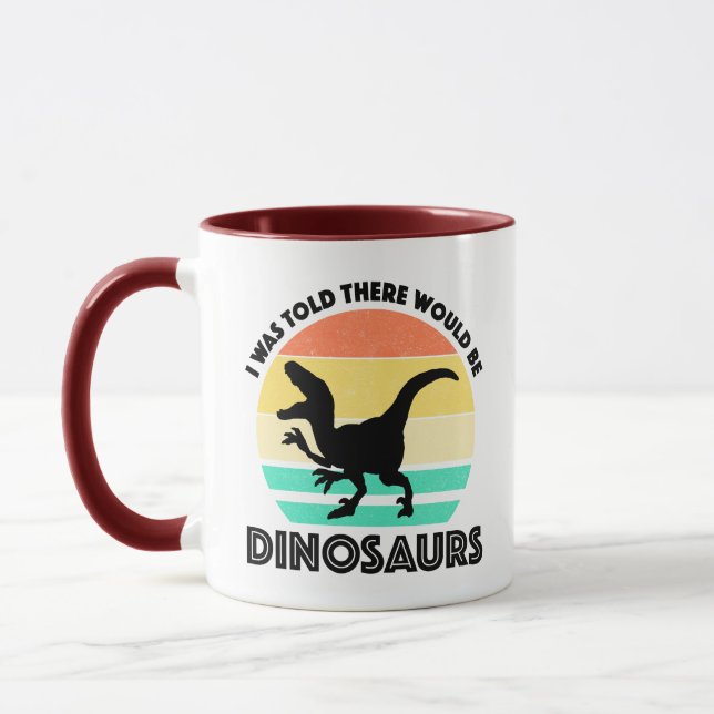 Jag fick höra att det skulle finnas dinosaurier mugg (Vänster)