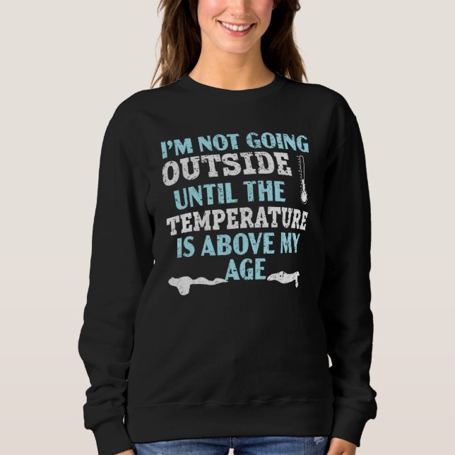 Jag går inte ut förrän temperaturen är över t shirt (Framsida)