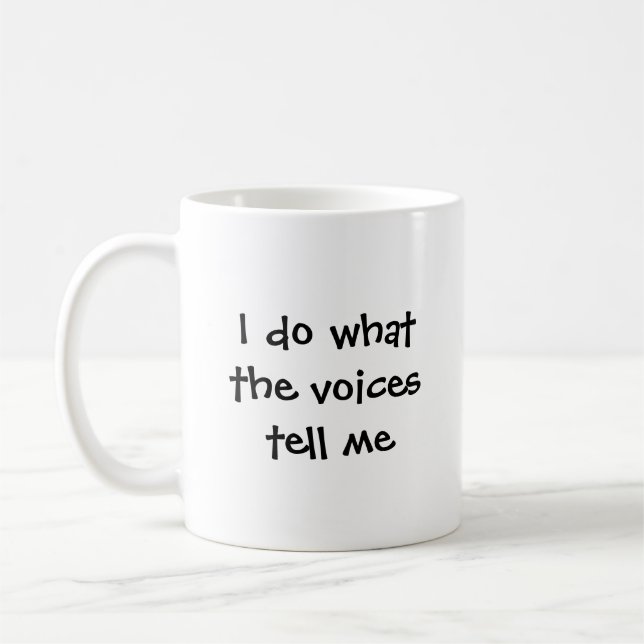 Jag gör vad uttrycker berättar mig kaffemugg (Vänster)