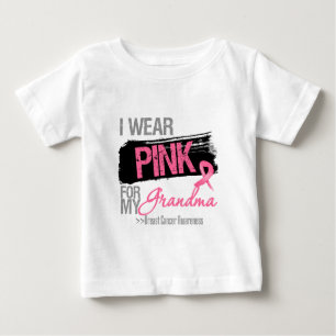 Jag ha på sig det rosa bandet för min tee shirt