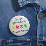 Jag har Autism Puzzes Knapp<br><div class="desc">Ett färgstarkt pussel delarare med ett budskap till kampanj för att öka medvetenheten om autism. Den här designen har färglöst puzzel delar i gröntens röda gult och blått med ett meddelande som säger: "Jag ignorerar dig inte. Jag har Autism"</div>