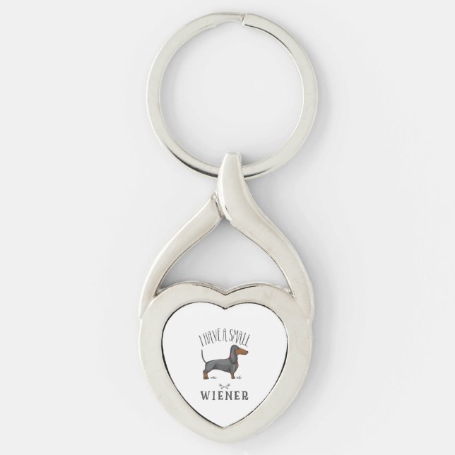 Jag har en liten wiener twisted heart silverfärgad nyckelring (Framsidan)