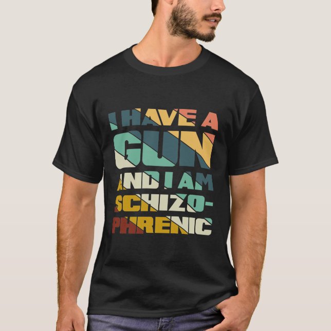 Jag har en pistol och jag är schizofren. t shirt (Framsida)