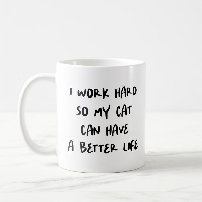 "Jag jobbar hårt.." Lovers och medarbetare i Cat L Kaffemugg (Vänster)