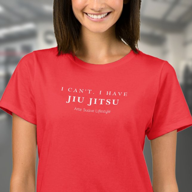 Jag kan inte ha Jiu Jitsu Arte Suave Womans T Shirt (Woman wearing red BJJ tshirt in a gym.)