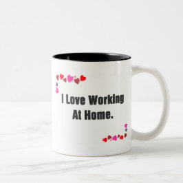Jag kärlek arbetar i mugg i hemmet