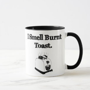 Jag luktar bränd rostat bröd mugg