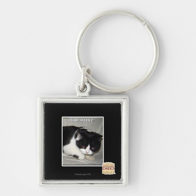 Jag meen inte 2 fyrkantig silverfärgad nyckelring (Framsidan)