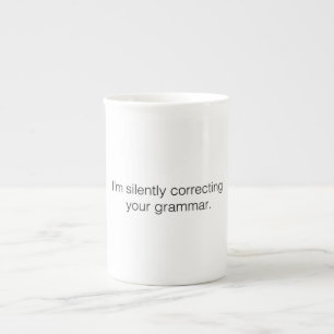 Jag rättar tyst din grammatik. benporslin mugg
