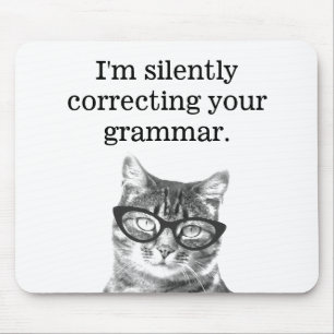 Jag rättar tyst din grammatikkatthinnan. musmatta