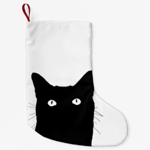 Jag ser katten klicka för att välja en liten julstrumpa