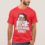 Jag tittar på dig i julklapp Jultomten T Shirt<br><div class="desc">Jultomten ser dig när du sover, han vet när du är vaken... Allvarligt talat, det är söt läskigt. Komikliga julsäsonger T-skjortor och kläder för att fira de kommande Julafton-helgdagarna! Ingen jul i party är färdig utan konstiga jultomtens helgdag-skjortor och fula tröjor, och den 25 december är inget undantag! Ha en...</div>