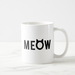 Jama textdesignen med svart kattöron kaffemugg