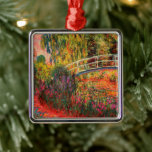 Japansk Bridge | Claude Monet Julgransprydnad Metall<br><div class="desc">Japansk Bridge,  även känd som Vatten-Lily Pond (1900),  från en serie oljemålningar av Franskens imponerande konstnär Claude Monet. Monets Vatten Lilies-serie skildrar blomsterträdgården i hans hem,  och var den huvudsakliga inriktningen för hans arbete under hans 30 livs senaste år. Använda verktygen för att lägga till anpassningsbar eller anpassa bilden.</div>