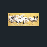 Japansk klocka, tryckning av Vintage. Canvastryck<br><div class="desc">Den japanska flocken av kranar vintage som målats av Ishida Yūtei fångar elegansen och smaken hos dessa härjade fåglar i en sund, naturlig miljö. Yūteis noggranna borsverk och känsliga använda av färg belyser kranarnas stora former mot bakgrund av mjuka, blomstrande landskap. Denna tidlösa biet återspeglar den harmoniska balansen mellan natur...</div>