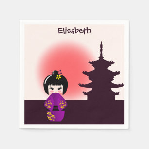 Japansk kokeshi doll vid templet under solnedgång pappersservett