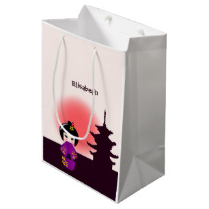 Japansk kokeshi doll vid templet under solnedgånge