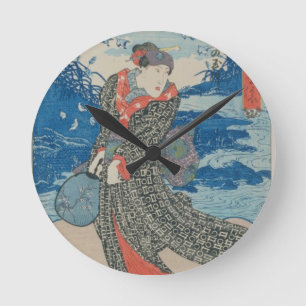 Japansk kvinna vid havet (färgträklosstrycket) rund klocka