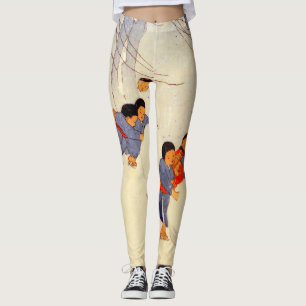Japanska barn som leker i tryckta balkar i snö leggings