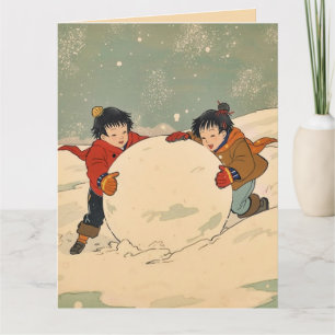 Japanska barn som rullar stor snöboll kort