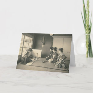 Japanska kvinnor sitta i golv kort