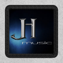 Järn-on-korrigering - JH Music Logotyp