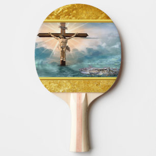 Jesus som hänger från en kristen crucifixionkor pingisracket