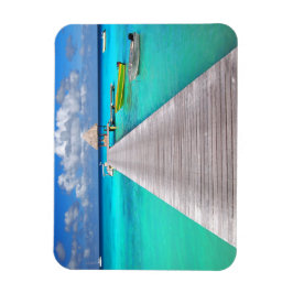 Jetty med båtar i tropiska laguner magnet