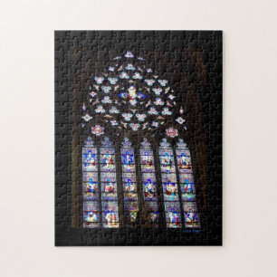 Jigszawpuzzle med fastglaset pussel