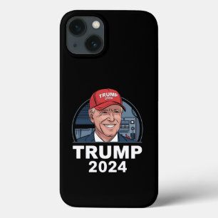 Joe Biden iklädd en Trump-hatt