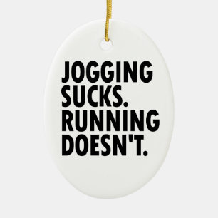 Joggande Sucks. Det går inte. Julgransprydnad Keramik
