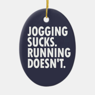 Joggande Sucks. Det går inte. Julgransprydnad Keramik