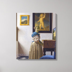 Johannes Vermeer - Dam Ställande vid ett jungfruli Canvastryck