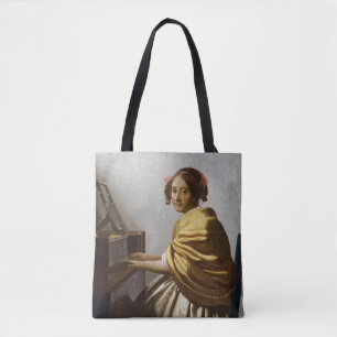 Johannes Vermeer - Young Woman Seated at Virginal Tygkasse