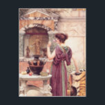 John William Godward - Vid Garden Vykort<br><div class="desc">Vid Garden av John William Godward Om John William Godward var en engelsk målare från slutet av tiden före-Raphaelite/Neo-Classicist.Förekomsten av vackra kvinnor i den studerade potten finns i så många av Godwarths kanvaser att många nykomlingar av misstag kategoriserar honom som en förRaphaelite, särskilt som hans palett ofta är en livskraftig...</div>