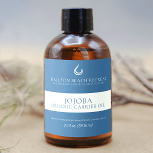 Jojoba bäraroljans skönhetsmärke blått spritflaskor etikett