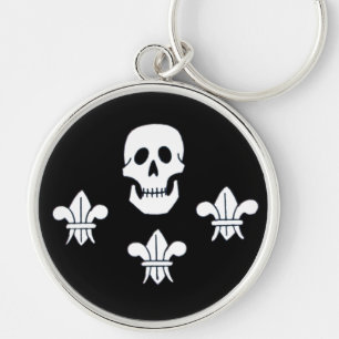 JOLLY ROGER SKULL OCH TRE LILIES FLAGGA RUND SILVERFÄRGAD NYCKELRING