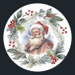 Jolly Smilde Santa Watercolor jul-andedräkt Runt Klistermärke<br><div class="desc">Nostalgiskt vintage inspirerat porträtt av att le St. Nicholas omgiven av en festlig vattenfärgad julandedräkt vid stil med evergreens,  blad och röda bär.</div>