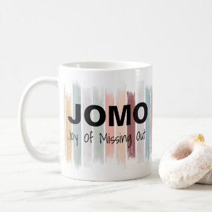 JOMO-glädje av saknaden ut målar borstar slår Kaffemugg