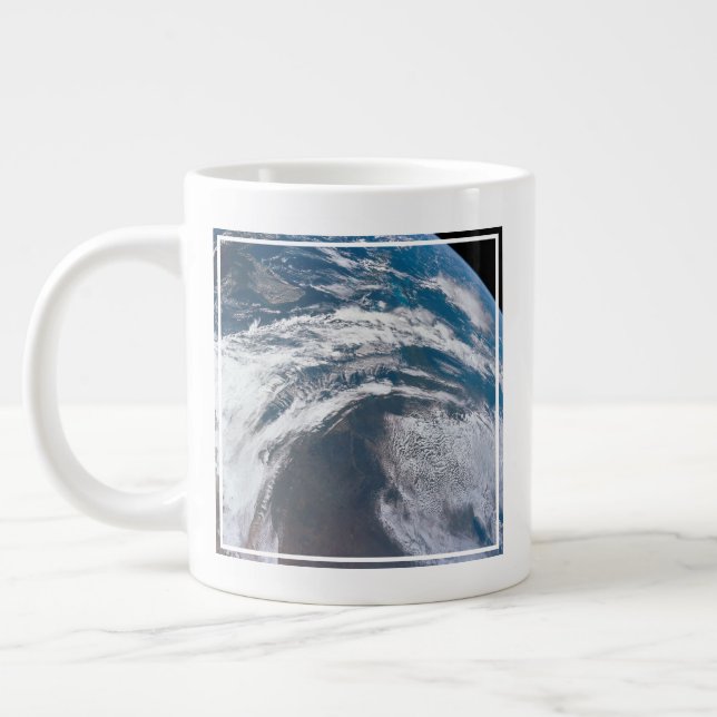 Jorden från Apollo 12-rymden. Jumbo Mugg (Vänster)