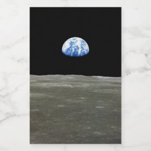 Jorden från månen i svarta rymden: Earthrise Mat Etikett