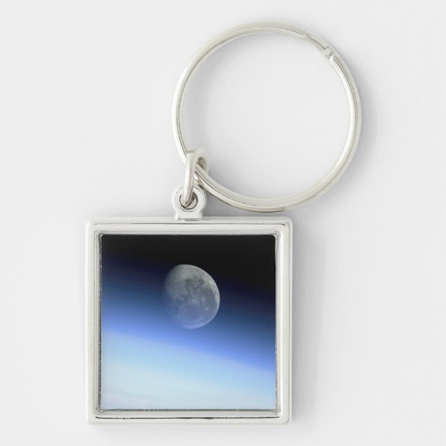 Jordens armar fyrkantig silverfärgad nyckelring (Framsidan)