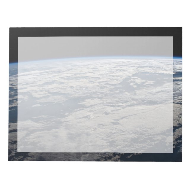 Jordens limb ovanför en grumlig Western Australien Anteckningsblock (Framsida)