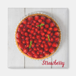 Jordgubbskaka med mynta på vitt trä magnet