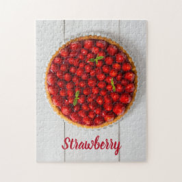 Jordgubbskaka med mynta på vitt trä pussel