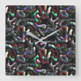 Jordmaskformade, färgade, artificiella behandlinga fyrkantig klocka