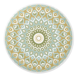 Jordnära mandala i grönt, guld och mjukt blått knopp