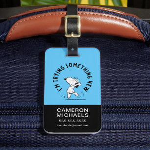 Jordnötter Snoopy försöker med något nytt Bagagebricka