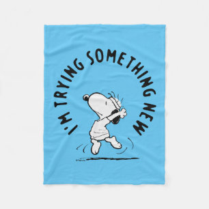 Jordnötter Snoopy försöker med något nytt Fleecefilt